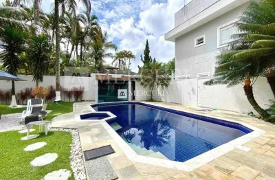 Casa no guarujá, jardim pernambuco, condomínio fechado, 4 quartos, sendo suítes e varanda gourmet - mercuri imóveis - imobiliária no guarujá