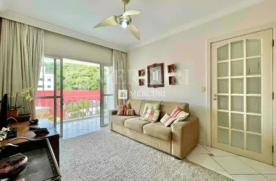Apartamento na praia da enseada com sacada e suítes, região dos hotéis