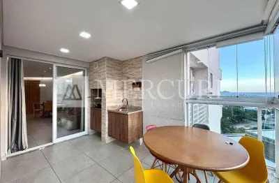 Apartamento no guarujá, enseada, varanda gourmet com vista mar e área verde.