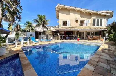 Casa no guarujá, condomínio fechado, jardim acapulco, 5 suítes, piscina e churrasqueira privativos mercuri imóveis - imobiliária no guarujá