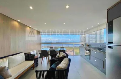 Apartamento no guarujá, enseada,2 quartos, sala para 2 ambientes e sacada com vista para o mar - mercuri imóveis - imobiliária no guarujá
