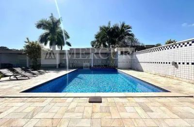 Casa no guarujá, condomínio fechado, jardim acapulco, 5 suítes, piscina e churrasqueira - mercuri imóveis - imobiliária no guarujá.