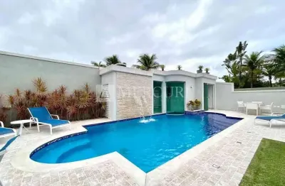 Casa no guarujá, condomínio fechado, jardim acapulco, 5 suítes - mercuri imóveis guarujá