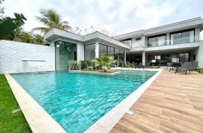 Casa no guarujá, condomínio fechado, jardim acapulco, 6 suítes - mercuri imóveis - imobiliária no guarujá