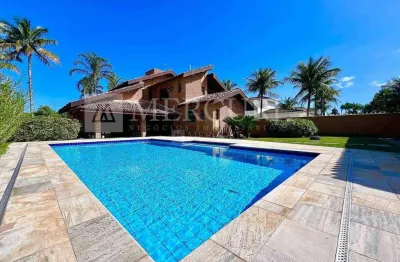 Casa no guarujá, condomínio fechado, jardim acapulco, 4 quartos, sendo 2 suítes, área gourmet com piscina - mercuri imóveis - imobiliária no guarujá