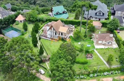 Casa de luxo em alto do capivari, campos do jordão: 5 dormitórios, 4 suítes, 660m² por r$ 4,2m para venda.