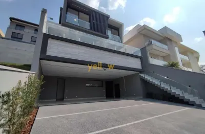 Casa luxuosa em arujá: 4 suítes no residencial real park