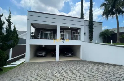 Casa de luxo em condomínio fechado em arujá com 4 suítes e 5 banheiros por r$ 4.5 milhões