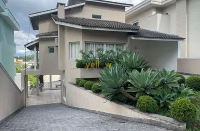 Casa em condomínio arujá 5 com 4 dormitórios e 3 suítes - aluguel por r$ 15.000.