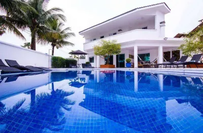Casa com 4 dormitórios à venda, 395 m² por r$ 3.900.000,00 - acapulco - guarujá/sp