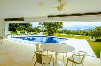 Casa com 6 dormitórios à venda, 634 m² por R$ 7.500.000,00 - Praia de Pernambuco - Guarujá/SP