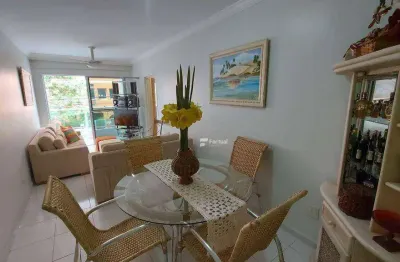 Espaçoso apartamento com sacada e 03 dormitórios na praia da enseada!! lado praia!! churrasqueira e serviço de praia!! ótima localização!!