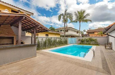 Casa em condomínio fechado com 4 quartos à venda na Avenida Romão Fidalgo Salgado Neto, 167, Jardim Acapulco, Guarujá