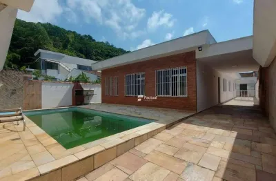 Casa térrea à venda, localização privilegiada na praia do tombo - guarujá / sp.