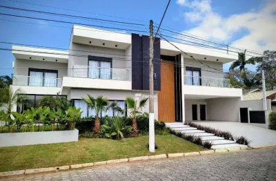 Seu refúgio dos sonhos: residência com 7 suítes e área de lazer completa