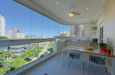 Apartamento de alto padrão com vista para o mar na praia da enseada.