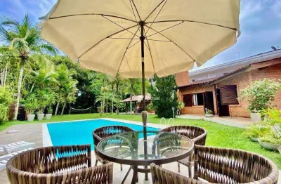 Casa contemporânea à venda no condomínio acapulco, guarujá/sp.