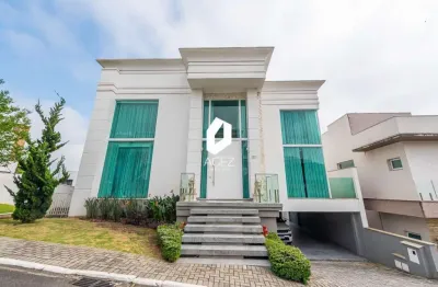 Casa mobiliada com 04 suítes, espaço gourmet e 04 vagas!