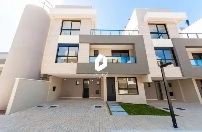 Casa em condomínio fechado em santa felicidade, 3 suítes e ático com terraço