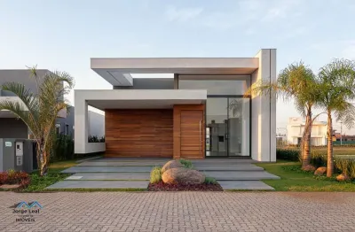 Casa em condomínio 3 dormitórios à venda condomínio reserva das águas torres/rs