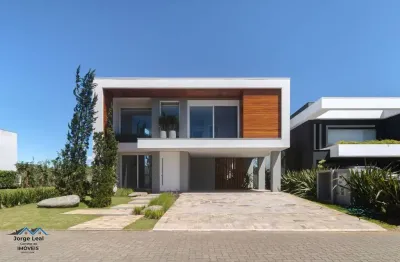 Casa em condomínio 4 dormitórios à venda condomínio reserva das águas torres/rs