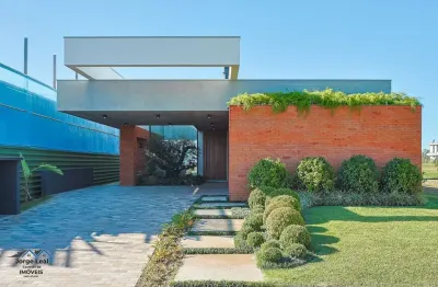 Casa em condomínio 3 dormitórios à venda condomínio reserva das águas torres/rs