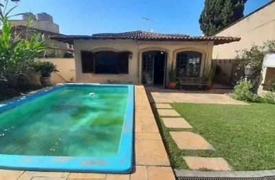 Sobrado com 3 dormitórios, sendo 1 suítes, sala de estar, sala de jantar, sala de tv,  - fl22