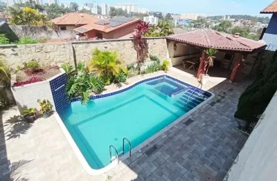 Sobrado em condominio com 5 suites e piscina e 3 vagas no pq dos principes