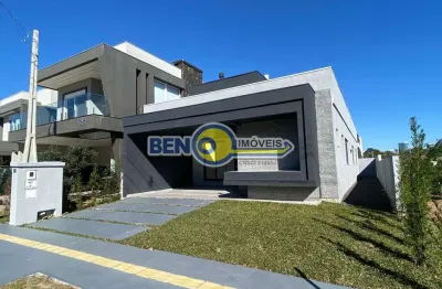 Casa de alto padrão com 3 dormitórios e pé-direito duplo em porto alegre