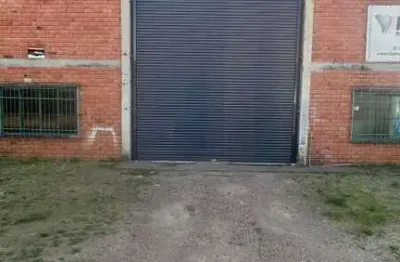 Pavilhão comercial/industrial para locação as margens da rodovia 118.