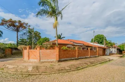 Casa com 3 quartos à venda na Rua Oiampi, 420, Guarujá, Porto Alegre