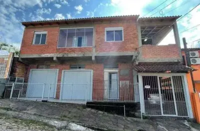 Prédio à venda na Rua Pereira Aguiar, 130, Santa Cecília, Viamão