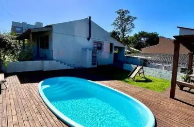 Belo imóvel com 3 dormitórios, sendo 1 suíte, em terreno de esquina!