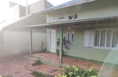 Casa com 4 quartos à venda na Avenida das Azaléias, 71, Tarumã, Viamão