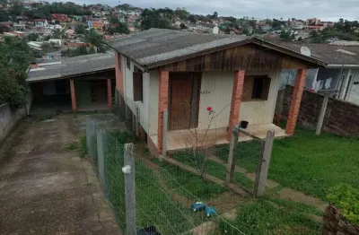 Imóvel bem localizado, no bairro tarumã, com 2 casas no pátio.