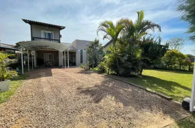 Casa em condomínio com 4 dormitórios, semi mobiliada, com placa solar, estuda parte do pagamento em apto na zn poa!!