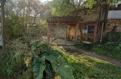 Terreno à venda na Rua Olavo Miranda de Figueiredo, 375, Tarumã, Viamão