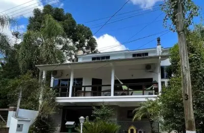 Casa em condomínio fechado com 3 quartos à venda na Rua Álamo, 60, Cantegril, Viamão