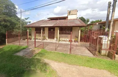 Casa com 4 quartos à venda na Rua Otávio Rocha, 110, Tarumã, Viamão