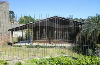 Casa com 3 quartos à venda na Rua Flodoaldo de Souza Feijó, 848, Tarumã, Viamão