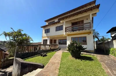 Casa com 5 quartos à venda na Rua Flodoaldo de Souza Feijó, 827, Tarumã, Viamão