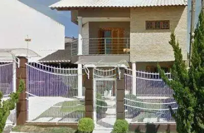 Casa com 3 quartos à venda na Rua Condores, 15, Jardim Algarve, Alvorada
