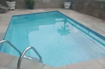 Apartamento dois dormitórios sendo uma suíte vila tupi praia grande sp