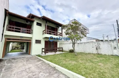 Casa com 3 quartos à venda na Rua Eugênio Portela, 913, Barreiros, São José por R$ 780.000
