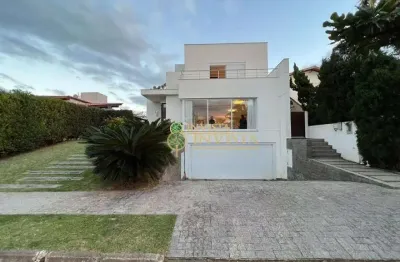 À venda na praia de jurerê internacional! alto padrão, piscina privativa, 430m², 4 suítes e 6 vagas de garagem.