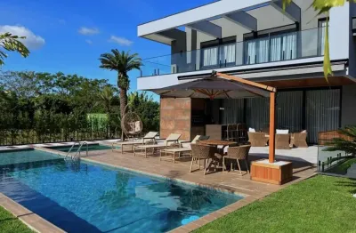 À venda | 600 m², alto padrão, piscina, varanda gourmet, 4 suítes e 4 vagas - praia de jurerê internacional, florianópolis.