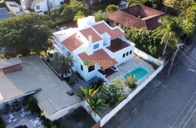 À venda | casa de 346 m², 5 quartos, piscina privativa e 4 vagas – com vista para a lagoa da conceição, florianópolis