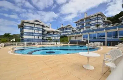 À venda | Sacada com churrasqueira, 90 m² privativos, 3 quartos, Vista Mar e 1 vaga de garagem - Praia Brava, em Florianópolis.