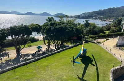 Mansão frente mar em condomínio fechado - à venda em cacupé, florianópolis.
