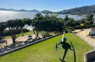 Mansão frente mar em condomínio fechado - à venda em cacupé, florianópolis.